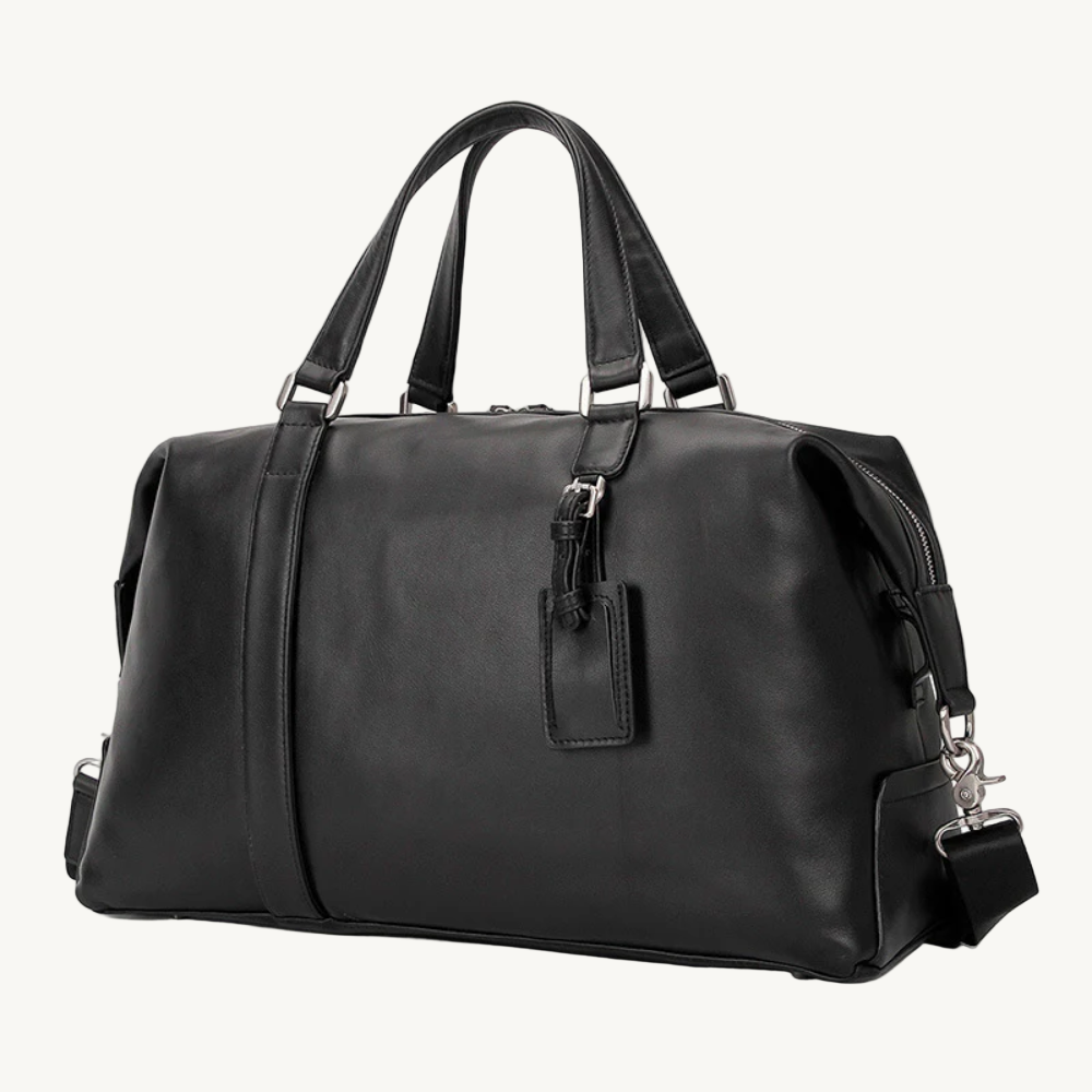Black leather duffel bag on a white background