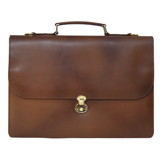 Brown cowhide leather briefcase with a top handle, adjustable shoulder strap, and gold-tone lock closure on the front flap