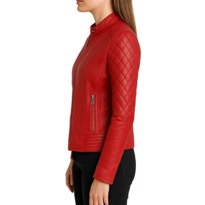 Women’s red quilted lambskin leather café racer jacket with shoulder quilting, asymmetrical left-side zipper, and a snap button collar.