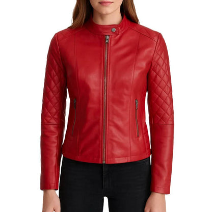 Women’s red quilted lambskin leather café racer jacket with shoulder quilting, asymmetrical left-side zipper, and a snap button collar.